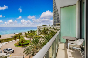 Wake Up to the Sound of Waves in a Stylish Condo #404 in a Luxury Resort